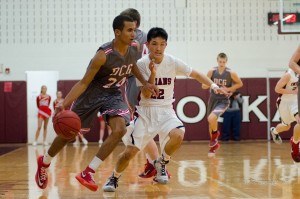 The Oskaloosa Indians Varsity Basketball team battled Tuesday against a potent Dallas Center-Grimes squad.