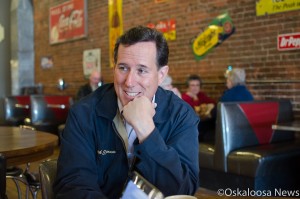 Rick Santorum inside Smokey Row Coffee this week as he met with Oskaloosa News about his potential campaign for president 2016. (photo by Ginger Allsup/Oskaloosa News)
