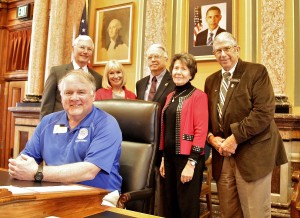 Pictured here are Rep. Vander Linden, Marcia Christensen, Dan and Vicki Bunnell, Rep. Maxwell, and seated is Roger Cox.
