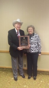 Ballard is pictured receiving his award from Naomi Christensen at Adventureland Inn