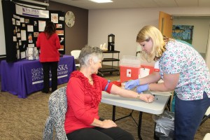 Mary Kelly of Oskaloosa had her blood drawn by Occupational Health Registered Nurse Brittney Adams at Mahaska Health Partnership’s annual Community Cholesterol Screening on Feb. 10. According to the American Heart Association, all adults age 20 and older should have their cholesterol checked at least once every five years to help detect indicators for heart disease, heart attack and stroke. MHP offered reduced-rate cholesterol screenings at its Oskaloosa campus and at New Sharon Medical Center in recognition of National Heart Month. 
