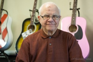 Pat Flaherty stands inside his new music store 'G-strings, Guitars & More' located on A Ave West in the former Adams Camera House location.