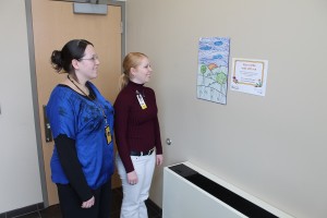 During their daily walk breaks, Courtney Ferree and Allison Shipley of Patient Accounts enjoy the artwork from Oskaloosa Elementary School students placed throughout the stairwells at Mahaska Health Partnership. MHP is participating in an “Art for Steps” project, sponsored by Blue Zones Project Oskaloosa and the MHP Wellness Team. 
