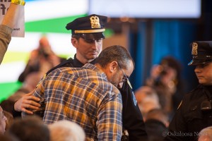 Protestor Joe Mangino was escorted from the premises after protesting New Jersey Governor Chris Christie on Saturday at the Ag Summit.