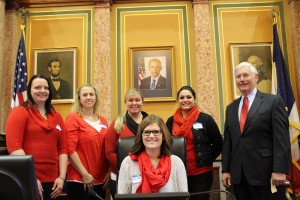 Pictured here are Amara Van Peurgem, Kelli Payne, Tiffany Hopkins, Nicole Danna, Rep. Vander Linden, and seated is Cassie Cumings-Peterson.