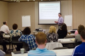 Matt Coen talks to the group about the process that will be undertaken to help make recreation and early childhood development more sustainable in the future for the Mahaska community.