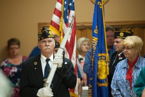 Members of the Oskaloosa American Legion present the colors for Monday's Memorial Day Service.