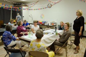Members of the AAUW group hold a meet and greet at the Oskaloosa Art Center this past week.