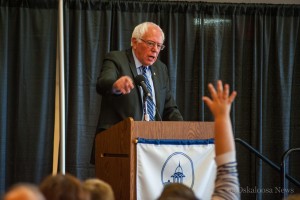 Senator Bernie Sanders (I) and a 2016 Democratic Presidential candidate opens the floor up for comment during his Oskaloosa event at William Penn University.