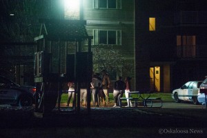 Police officers with the Oskaloosa Police Department and Mahaska County Sheriff's Office wait to let residents back in to Southern Hills Apartment until confirmation there was no danger.