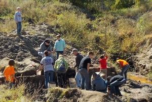 Orange Elementary from Waterloo took part in digging on Friday at the mammoth site in Mahaska County.
