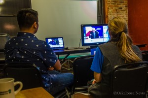 A group of caucus goers gathered inside Smokey Row on Saturday evening to listen to the 2nd debate for candidates seeking the Democrat Party nomination for President.