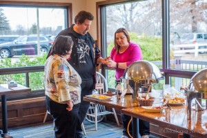 KBOE's Bob Allen and his wife (left) try out some of the different chili varieties at Paws for a Cause.