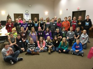 Lynnville-Sully's sixth grade class visited Pella’s Christian Opportunity Center on Monday, Dec. 21. Students learned more about COC’s services, interacted with people supported and tried their hand at real jobs completed by people supported in COC’s plant.