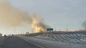 The smoke rises from a single vehicle accident south of Oskaloosa on Thursday morning. (photo by Bill Ryan)