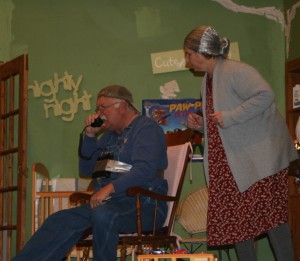 Mama Hooper (Sharon Ringelestein) watches Papa Hooper (Mark Hansen) as he tries to contact his “good buddies” on his portable CB radio in a scene from the Fremont Lions Club production of “Virgil Wins The Lottery.” The show runs Friday and Saturday at 7 p.m. and Sunday at 2 p.m. at the Fremont School. A pre-show meal is available beginning twos before show time in the school cafeteria. 