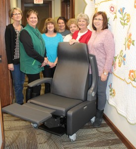 Members of the Mahaska Hospice Auxiliary are shown in front of one of three medical grade recliners they recently purchased for the MHP Hospice Serenity House, spending a total of $6,510. The chairs have a lot of features ideal for hospice patients, including a pull away side so a patient can be seated into the chair from either direction. It is also made of heavy duty antimicrobial material and is on wheels so patients can easily be moved from room to room and out on the Serenity House decks in nicer weather. Hospice Auxiliary members, from left, are: Janet Farner, Kim Roozeboom, Shari Blattler, Carol Knoot, Connie Sheesley, Becky Shafer and Mary Anderson. 