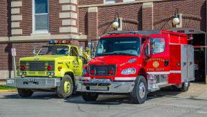 The old Oskaloosa Engine 74 (left) sits next to the new Engine 74 in front of the Oskaloosa Fire Station on Friday morning.