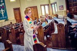 Rev. Liz Colton lead nearly a dozen individuals in a time of prayer for the victims in the Orlando terror attack.