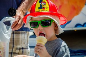 Learning about fire safety and helping to raise money for kids in need. This area youngster was enjoying the Shriners Club Jail and Bail event on Saturday.