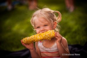 This young lady enjoyed the fresh roasted sweet corn on Thursday night.