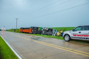 Strong winds from a storm that blew through the Mahaska County area on Wednesday are thought to have toppled this tractor-trailer along Merino Ave.