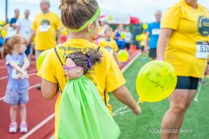 Honoring and remembering those that lost was the motivation for many at Saturday's 'Run in the Sun'.