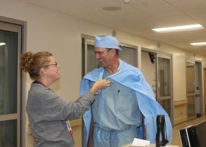 MHP General Surgeon Dr. Timothy Breon was given a special “MHP superhero cape” by Clinical Quality Director Gloria Reed on Friday as she told him he was named a 2016 Iowa Hospital Hero by the Iowa Hospital Association. 