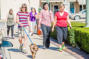 Enjoying the fall weather, participants walked for 30 minutes around the Oskaloosa square on Wednesday as part of the Healthiest State Initiative.