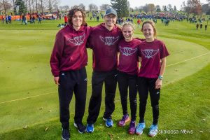 L to R: Sophomore Carter Huyser, Coach Mike Comfort, Senior Sienna DeJong, and Sophomore Lauren Coon.