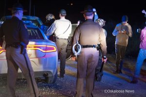 A protestor is taken into custody at a protest at a DAPL location in Mahaska County on November 7, 2016.