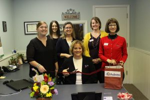 Photo taken by Mendy McAdams – Marketing and Development Director: Pictured at the recent ribbon cutting are Codie Amason, Chief Operating Officer, Casey Riley, Ambassador; Cheryl Plank, Executive Director; Laurie Lenertz, Mahaska County Area Director; Amy Meyer, Ambassador; and Beth Overton, Ambassador.