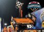 Ian Madsen celebrates a feature win and a championship at Knoxville (Knoxville Raceway Photo)
