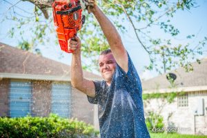Josh Crouse is seen here trimming yet another tree in the Rockport, Texas area. 