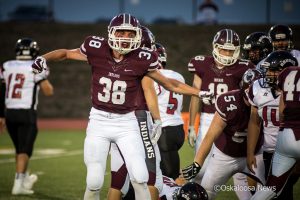 #38 Cole Kraber gets excited after making a key tackle against Fort Madison.