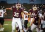 #38 Cole Kraber gets excited after making a key tackle against Fort Madison.