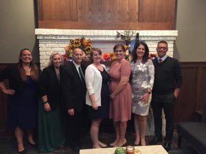 Katie Orlando, from BBBS of Northeast Iowa (left). Pictured with Katie are members of the advisory board in attendance. Left to right, Katie Orlando, Molly Coster, Steve Burnett, Amy Meyer, Katie Trainer, Debbie Guild, Matt Tippett. (submitted photo)