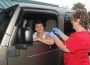Rain didn’t stop 75 people from participating in the Drive-Thru Flu Clinic sponsored by Mahaska Health Partnership Public Health on Saturday, Oct. 7. The entrance #1 awning provided the perfect shelter for those wanted to receive their flu vaccination in the comfort of their cars. Joan K. Wefer of Oskaloosa is shown receiving her flu shot from MHP Public Health Nurse Judi Veldhuizen. Weekly Flu Vaccination Clinics are also being offered at MHP, entrance #4 on Wednesdays from 7 am to 6 pm. Appointments are not needed. In addition, flu vaccines are available by appointment; please call 641.672.3360. (submitted photo)