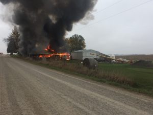 A reader submitted this photo of a machine shed on fire at 2306 Yarnell Avenue east of Rose Hill.