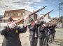 The honor guard performs their 21-gun salute on Saturday after the program at the American Legion. November 11, 2017
