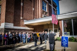 The honor guard raises the flag over the Mahaska County Senior Center on Thursday, November 9, 2017.