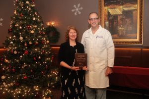Dr. Kymberly Life was named the 2017 MHP MVP (Most Valuable Provider) at Mahaska Health Partnership’s annual Provider Appreciation Dinner. She is presented this “Golden Stethoscope” award by MHP Chief Medical Officer Tim Breon.