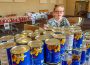 Sunny Netland helped out Friday afternoon filling boxes for the Rotary Food Basket program.