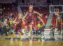 The Oskaloosa Indians celebrate earning their first ever shot at a state title in basketball.