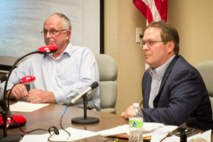 Mahaska County Supervisors Willie Van Weelden (left) and Mark Groenendyk (right) lay out their case as to why they don't believe the agreement between 911 and Mahaska EMA is invalid.