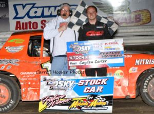 Cayden Carter took the checked flag in stock cars at the Southern Iowa Speedway on April 25, 2018. (photo by Carroll Hoover)