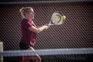 Josie Bunnell battles against Norwalks Emma Tollefson on Tuesday in Oskaloosa.
