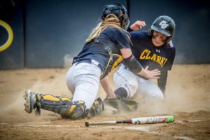 William Penn defends the plate against Clarke on Saturday.