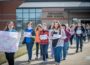 Students from Oskaloosa High School walk out on Friday, April 20, 2018 to remember those killed in school shootings.