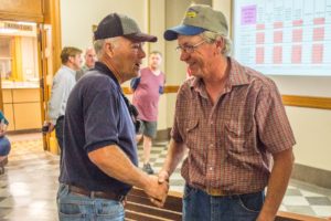 Steve Parker (left) and Steve Wanders (right) shake hands after the results came in on Tuesday night.